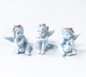 Rozmýšľajúci Anjel s Ružou